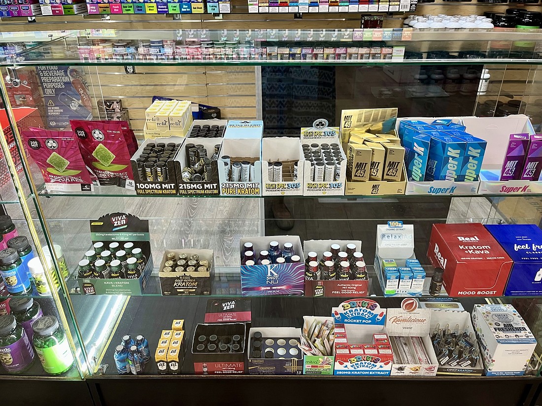Kratom products are displayed in a case at Wild Smoke Shop off of State Road 64. Kratom can be bought in a variety of forms from powders to drinks.
