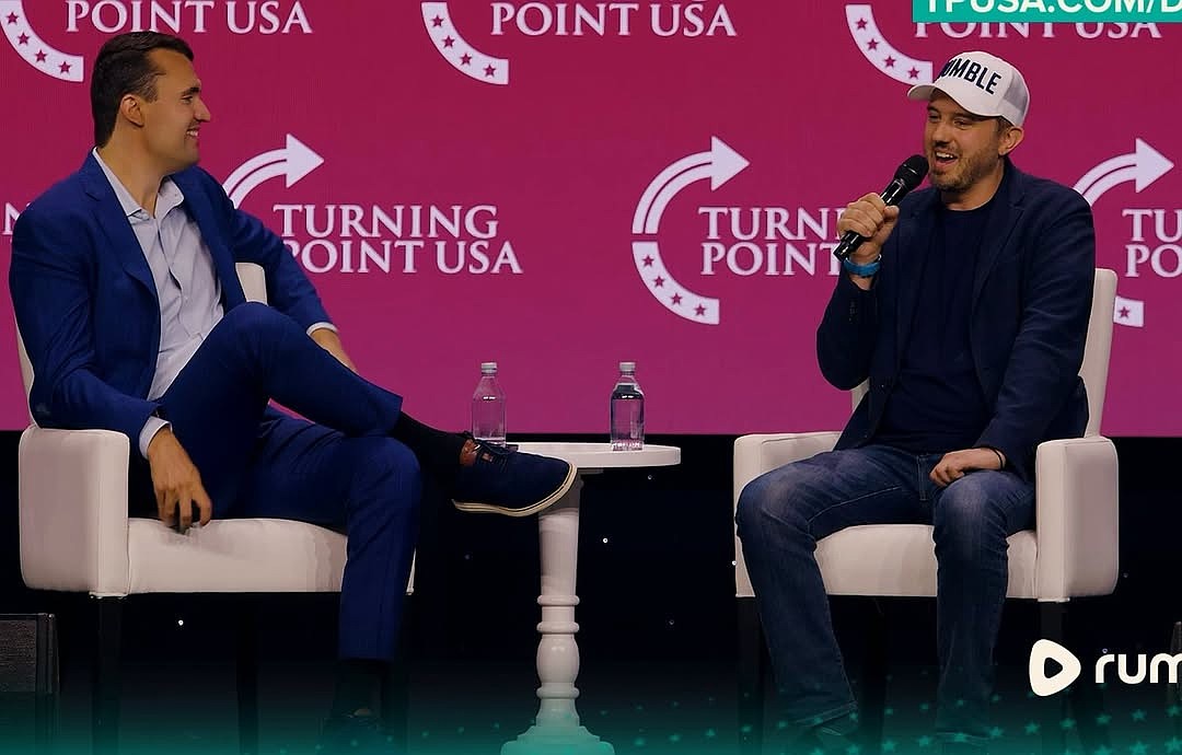 Charlie Kirk (left) and Chris Pavlovski share the stage at a Turning Point USA event. Pavloski, chairman and CEO of the video platform Rumble, said Kirk was an early investor in Rumble and played a large part in bringing Rumble's headquarters to Longboat Key. "He brought free speech to Longboat Key and made it the free speech capital of the world," Pavlovski said.